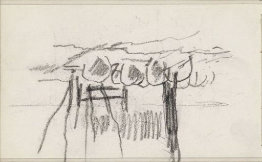 Flock of sheep by a fence