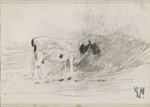 Cow grazing by a hay bale in a landscape