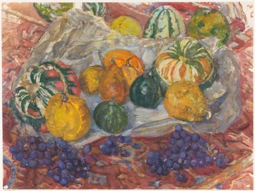 Still life of pumpkins and grapes on a cloth