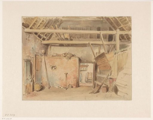 Interior of a barn with a view through to the kitchen