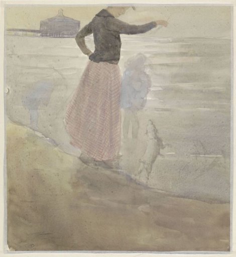 Woman with two children and a small dog at the beach