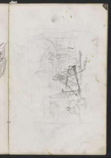 Man making a wooden structure in a garden