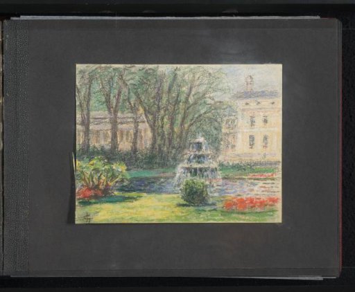 Park with trees, flowers, and a pond with fountain