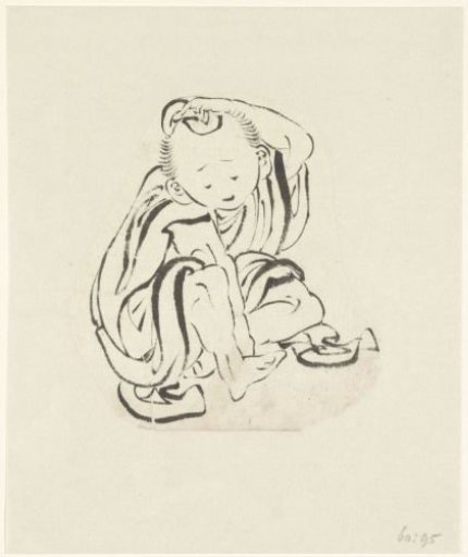Seated man rubbing a cloth on his head