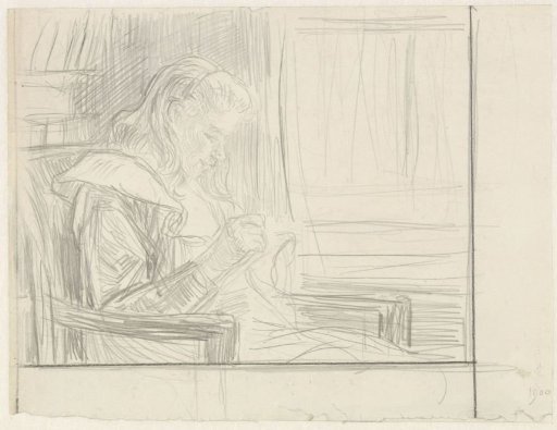 Girl working in a chair by the window