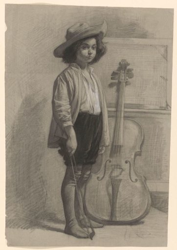 Boy standing by a cello