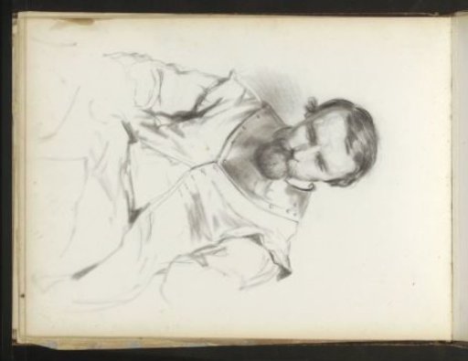 Seated man with a beard and metal collar