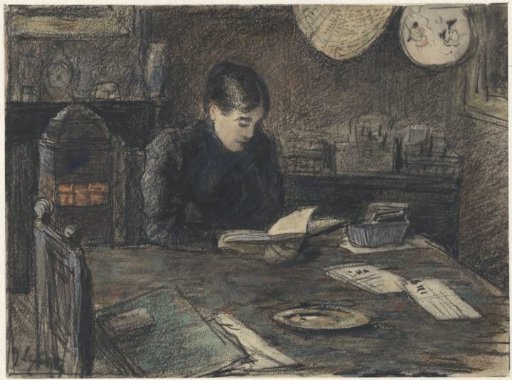 Woman reading at a table