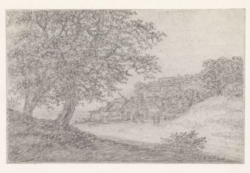 Road between hills, a village to the right
