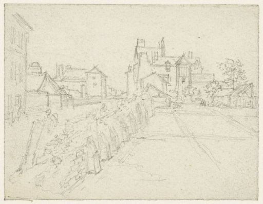Street in which a wall is being demolished