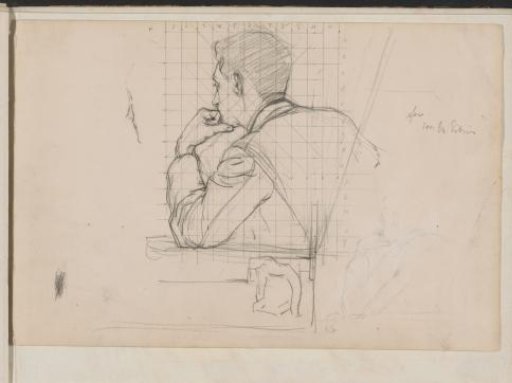 Young man leaning on a table with his elbow
