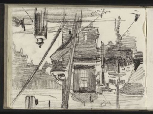 Jetty with Boats at the Damrak in Amsterdam