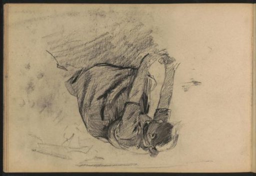 Kneeling young woman in the countryside