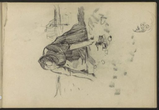 Kneeling woman in the countryside and a head