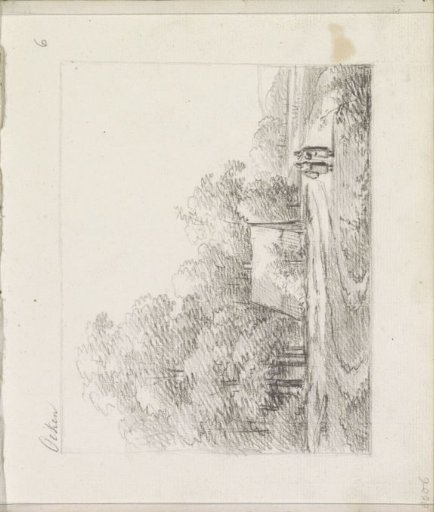 Two women on a path alongside a house