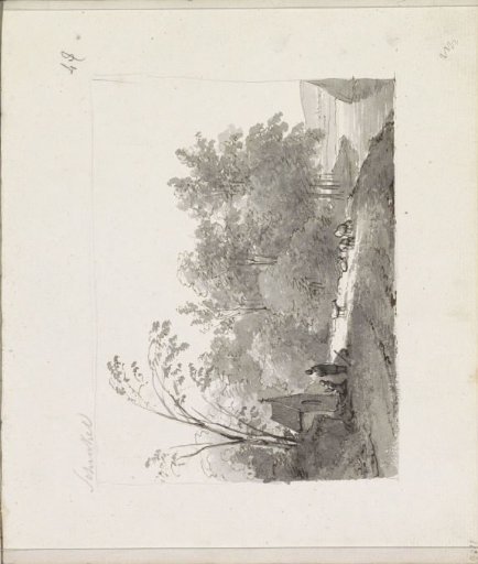 Praying figures at a chapel by a road