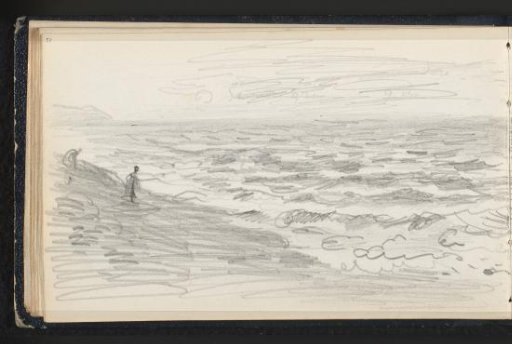 Figure on the beach by a stormy sea