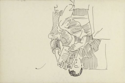 Man reading in an armchair