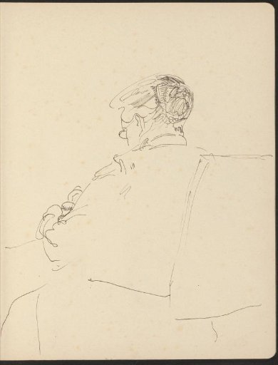 Woman doing needlework in a chair
