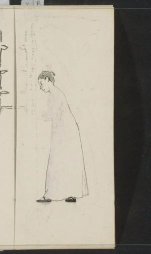 Standing woman in a long dress