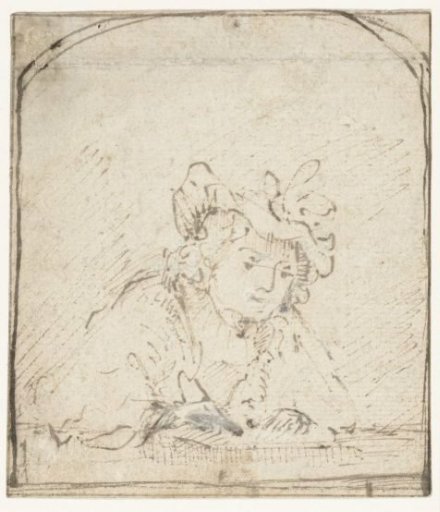Young man drawing at a table