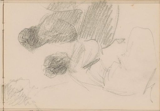 Two women, one sitting by the chair of the other