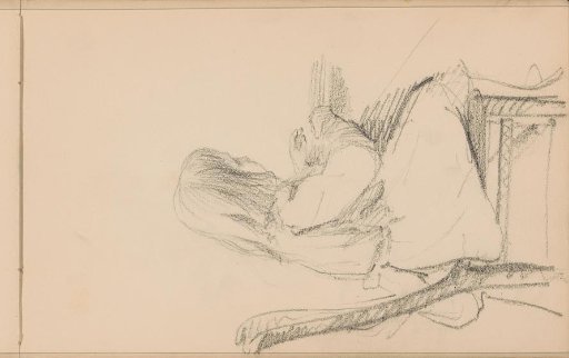 Girl Sitting at a Table