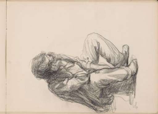 Man sitting on a stool or a felled tree trunk