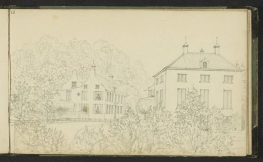Two houses in a wooded setting