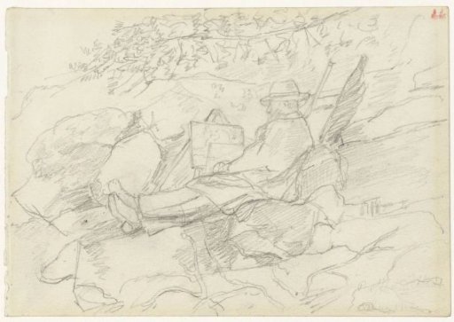 Painter in a rocky landscape