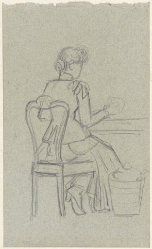 Woman seated at a table