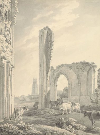 Ruin of Glastonbury Abbey with the tower of St. John in the background