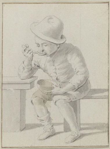 Seated boy eating soup with a hat