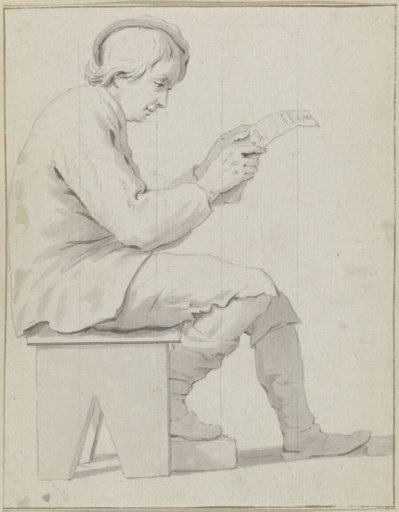 Young man sitting on a stool with a document in his hands