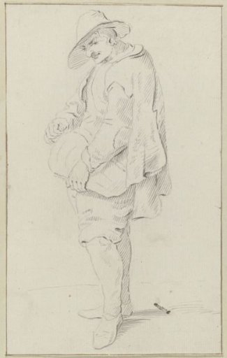 Standing man with hat playing a hurdy-gurdy