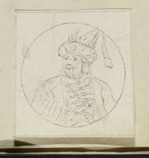 Bust of a bearded man with a pointed cap in a circle