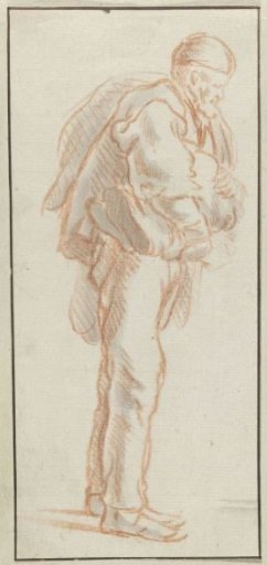 Standing man with belongings over his shoulder and under his arm