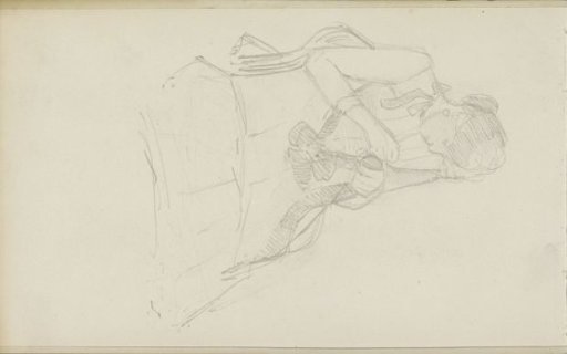 Woman doing needlework in a chair