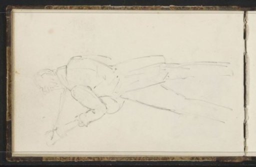 Standing man reading a newspaper