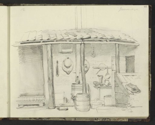 Exterior of a farmhouse with an awning