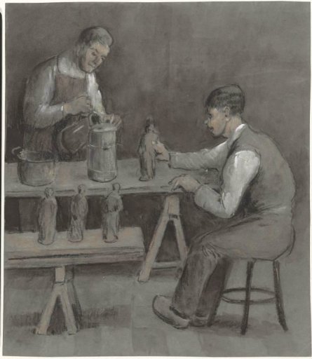 Two workers making figurines