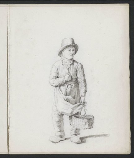 Boy in clogs with a wicker basket