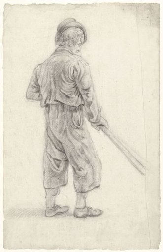Standing man with staff in his hands, seen from the back
