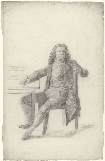 Seated man at table with pen in right hand, looking around