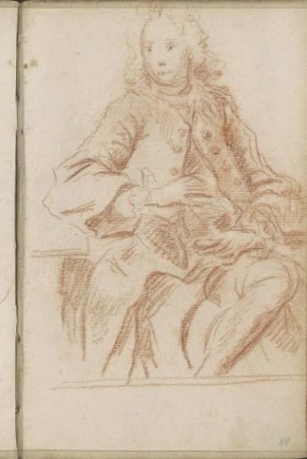 Seated man before a table