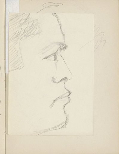 Face of a man in profile to the right
