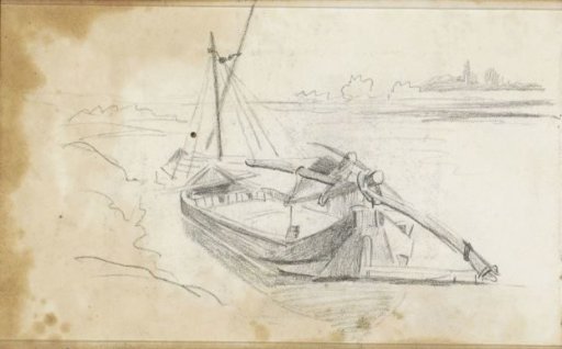 Wooden rowboat on the shore of a river or lake