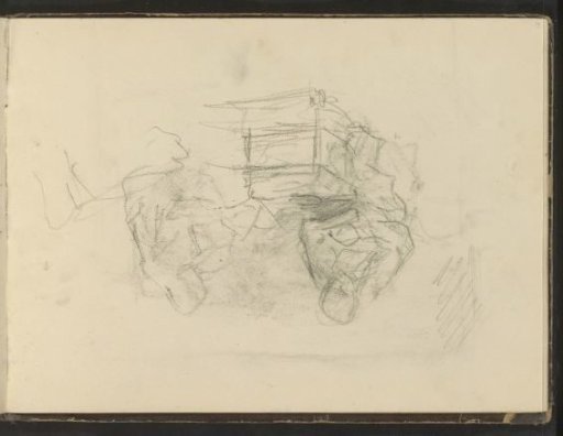 Two figures seated at a table