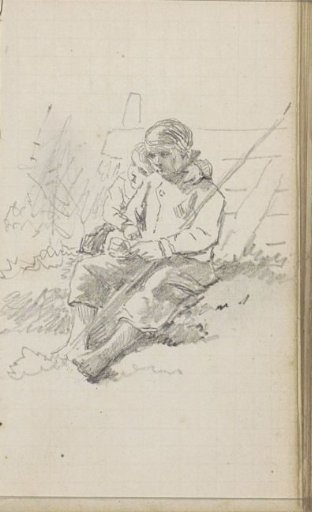 Two seated children on the grass by a fence