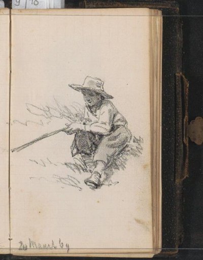 Seated boy on the grass